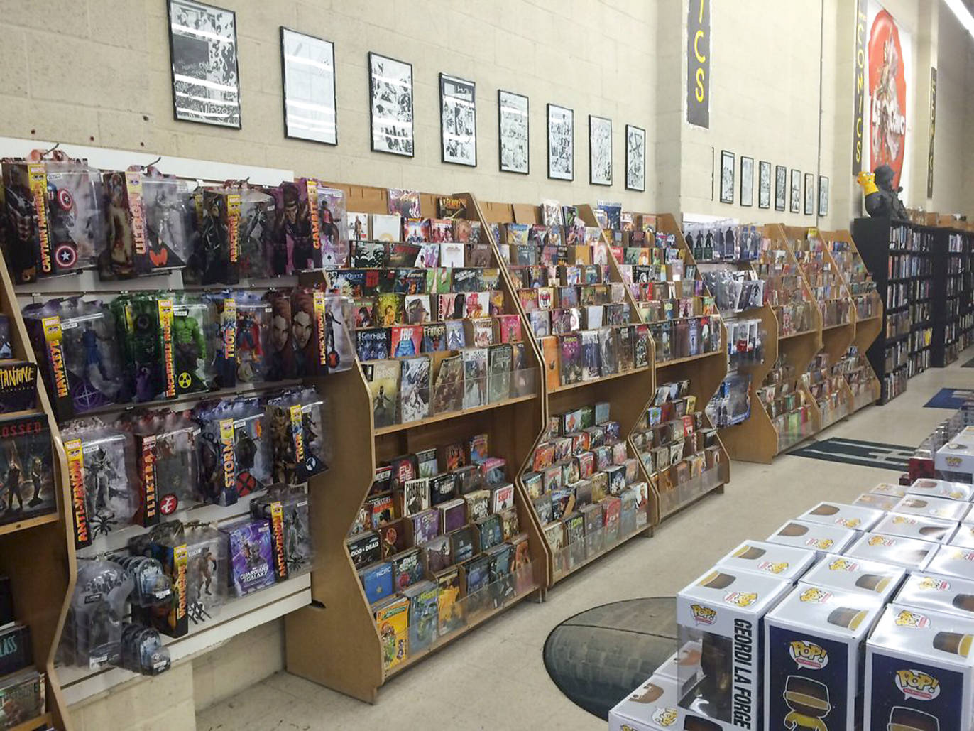 Comic book store guide for graphic novels and superhero sagas