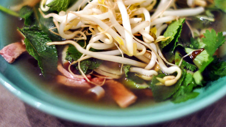 Bowl of pho soup with bean sprouts