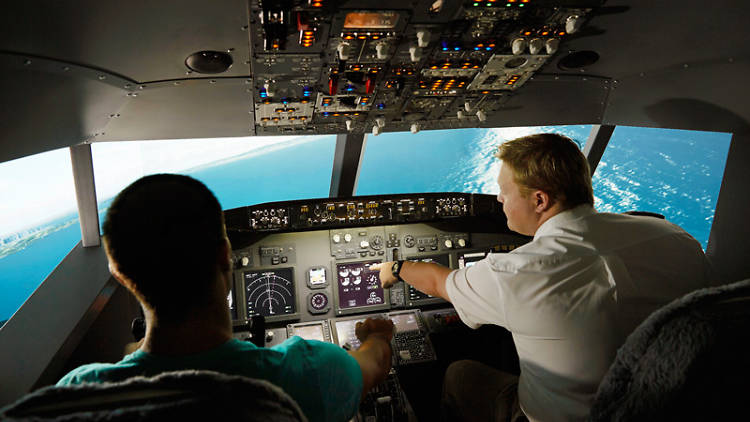 Two men flying a plane