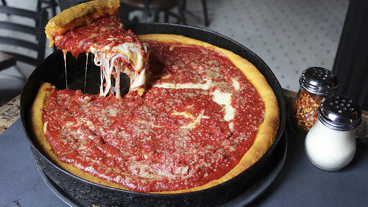 Devour a slice of deep dish pizza