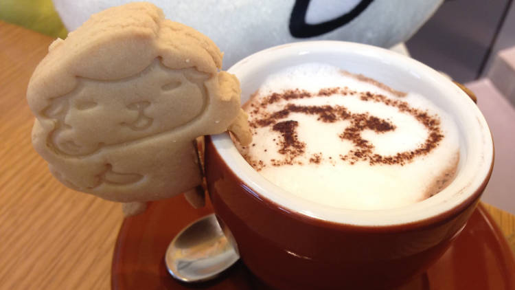 a coffee cup at Eat All Day Cafe in Siam Square One