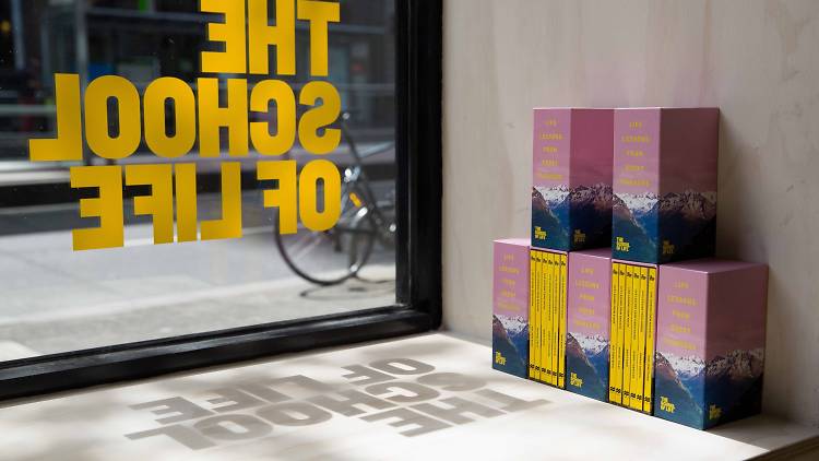 Books on a window shelf at the School of Life