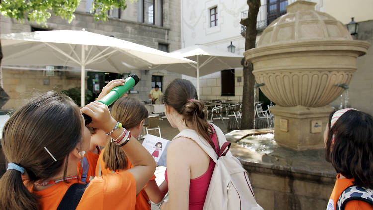 Play detective in Poble Espanyol on Montjuïc