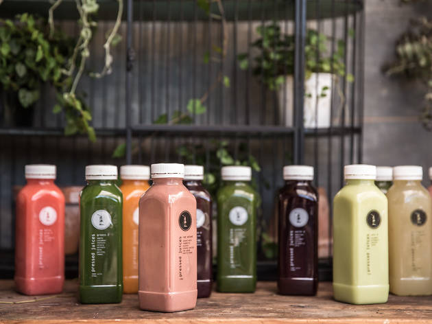 Pressed Juices A range of colourful juices in plastic bottles