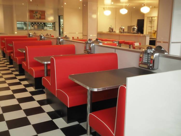 Share a milkshake at an old-school diner 