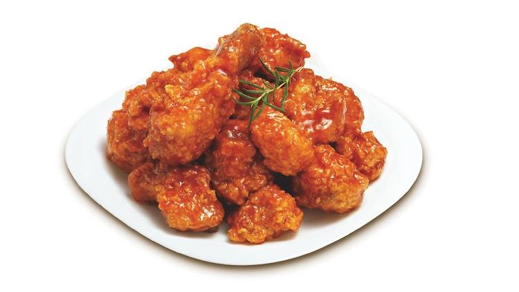 Korean Fried Chicken in spicy sauce on plate