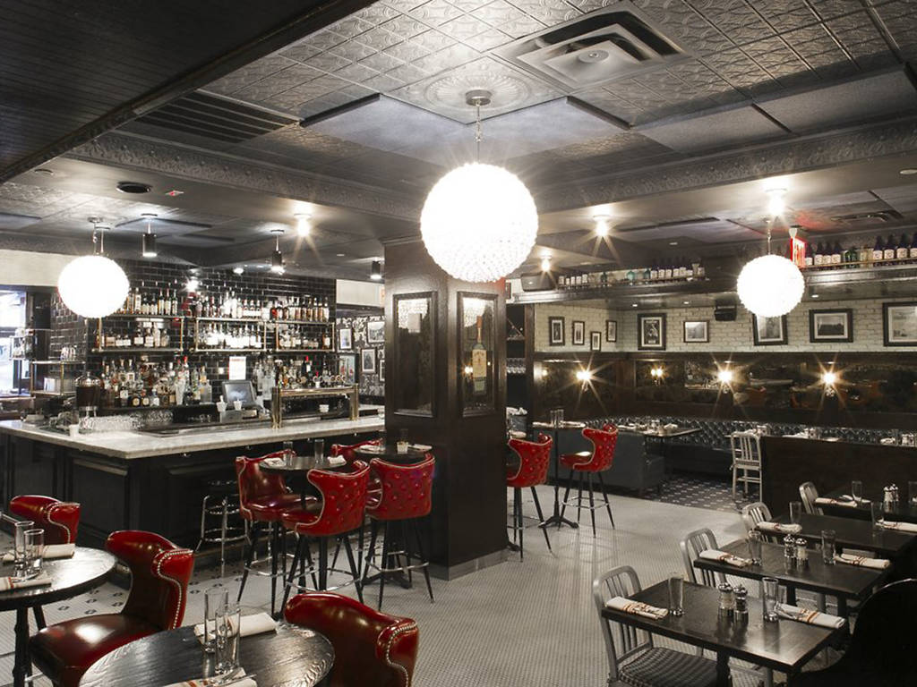 Best happy hour Midtown bars, including Jimmy's Corner and Rudy's
