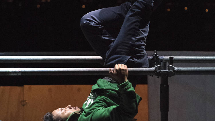 Man doing parkour on stage