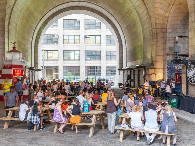 A giant Oktoberfest celebration is happening under the Manhattan bridge