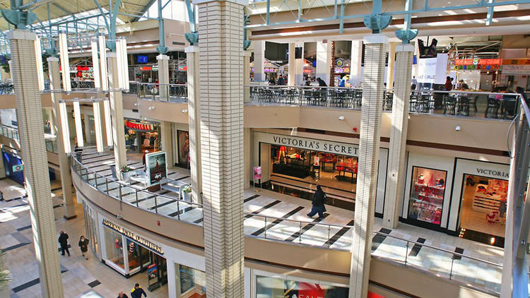 Shoppers walk through the Westfield Garden State Plaza mall on