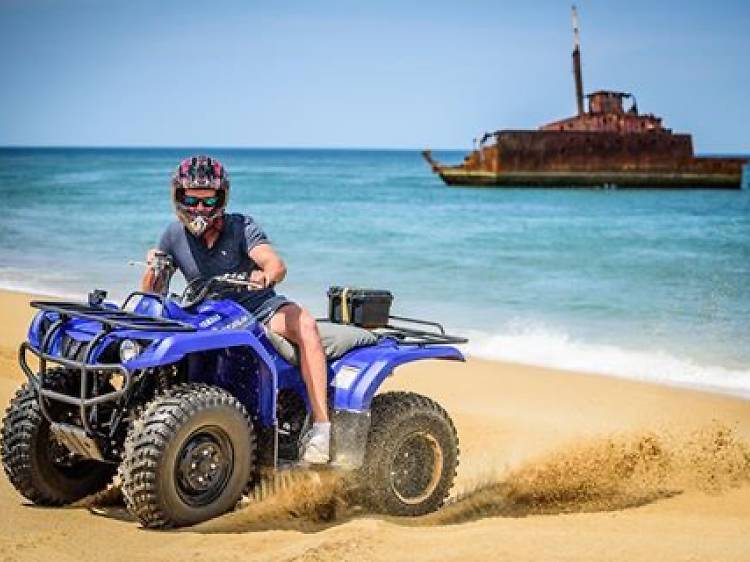 Quad Biking over Stockton Bight Sand Dunes