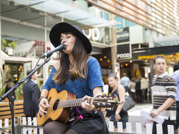 A busker performs at the 2014 Time Out Hop Up in Sydney