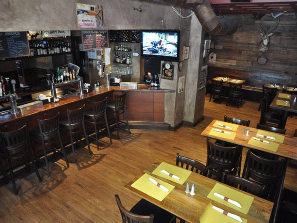 Best happy hour Midtown bars, including Jimmy's Corner and Rudy's