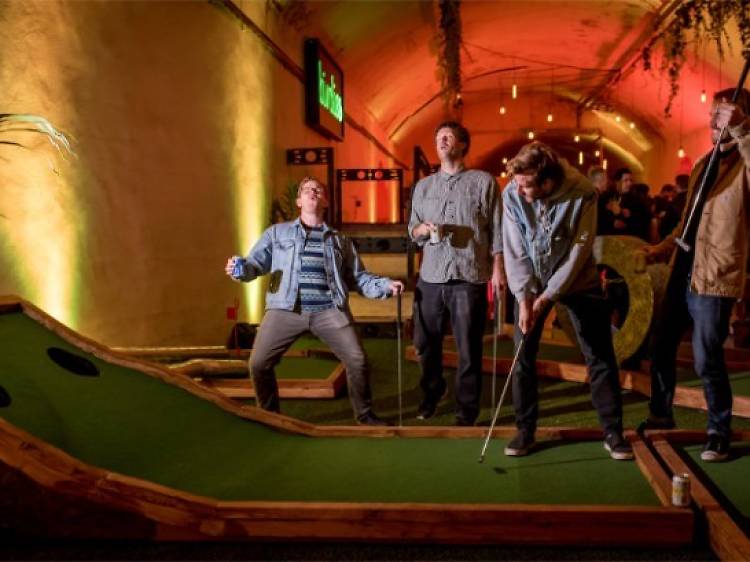 Score a hole-in-one at a crazy golf course with a twist