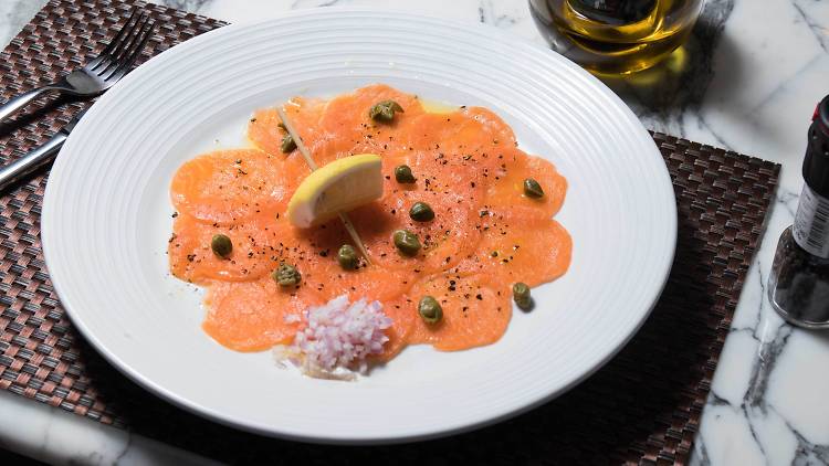 salmon cappaccio at Prime in Compass Skyview Hotel