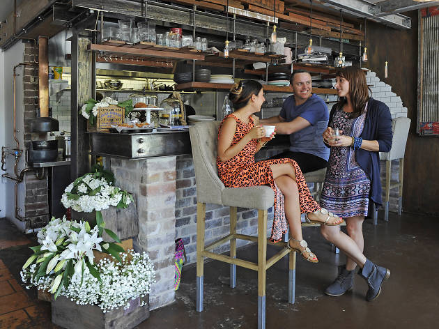 Henri Marc cafe Penrith Three people chatting at Henri Marc cafe