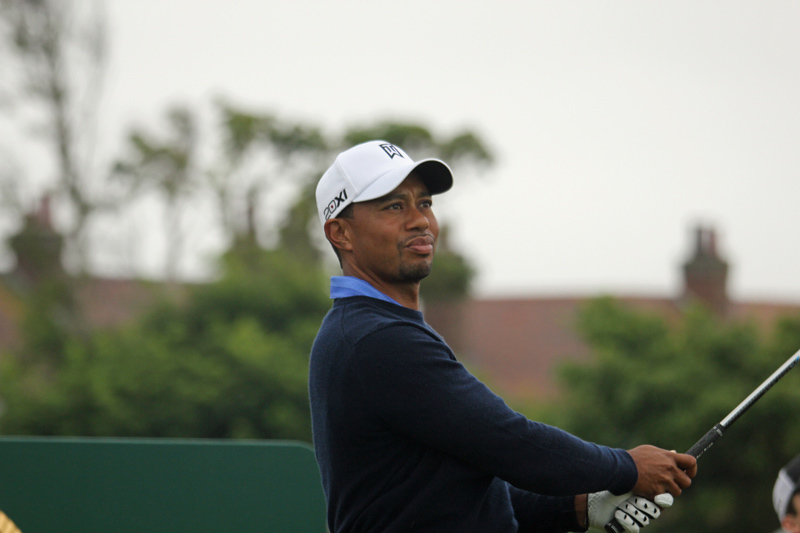 what time is tiger teeing off today