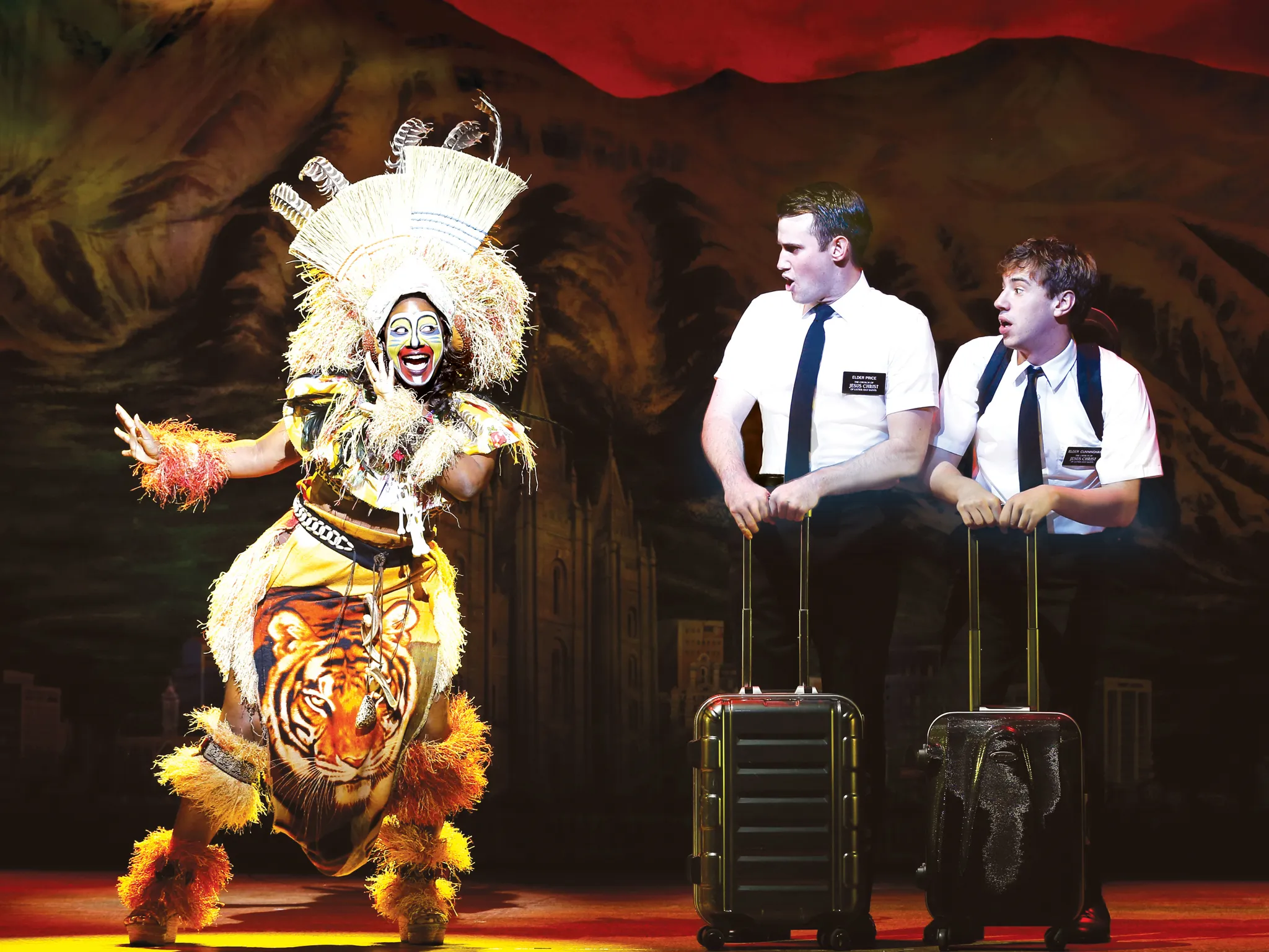 The Book of Mormon 2017 Princess Theatre Melbourne production still 01 feat Phyre Hawkins Ryan Bondy and A J Holmes photographer credit Jeff Busby