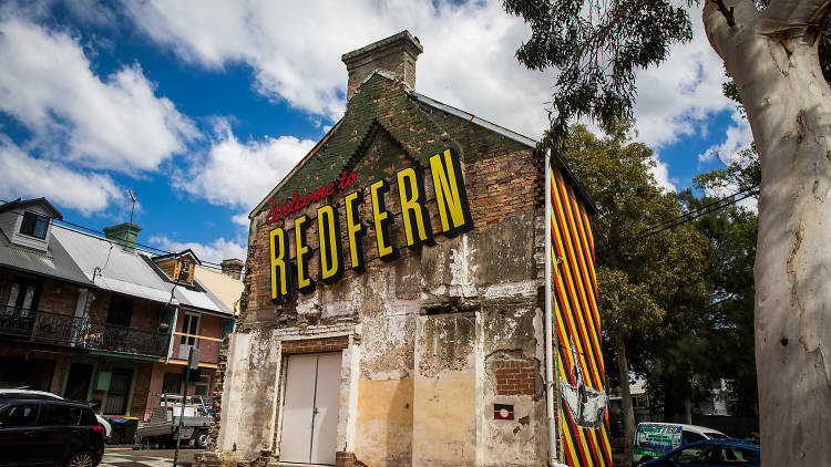 Victorian terrace painted with Aboriginal flag colours