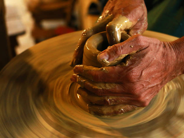 Generic pottery throwing on wheel Generic pottery throwing on wheel