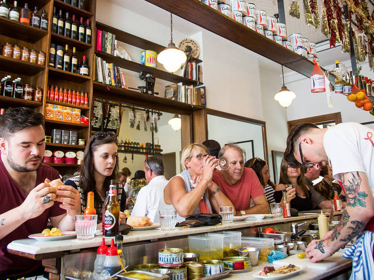 People eating at the deli counter