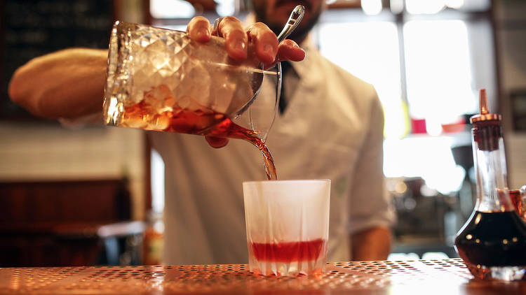 Pouring negroni at Bar Americano