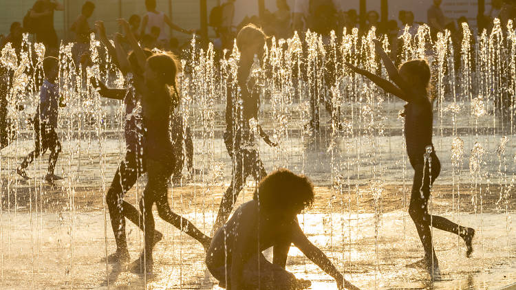 Dance among the fountains as the trains roll by