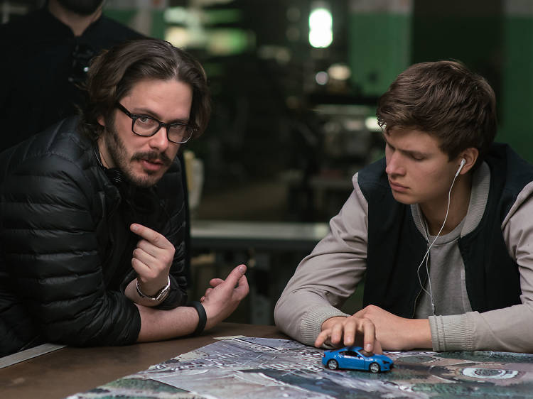 Baby Driver, Director Edgar Wright (left) and Ansel Elgort on the set of TriStar Pictures' BABY DRIVER.