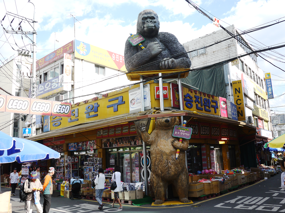 Korean stationery and design goods shelves lined with notebooks pens and cute goods along Dongdaemun Stationery Street in Seoul