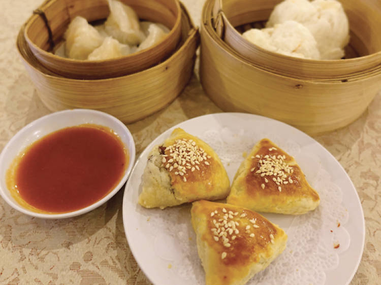 Pick out dim sum from a pushcart at Red Star Restaurant