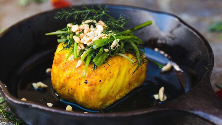 Cooked fish in a cast iron pan