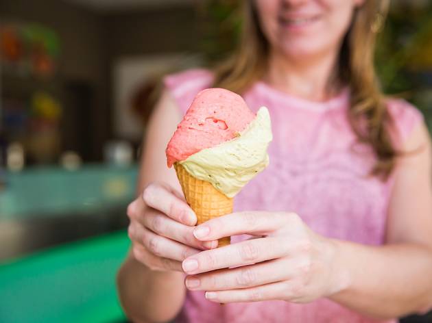 Woman with ice cream at Gelato RivaReno Woman with ice cream at Gelato RivaReno