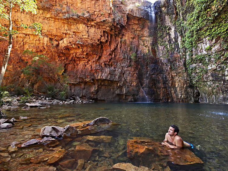 Guy swimming at Emma Gorge on El Questro Station, located near Kununurra