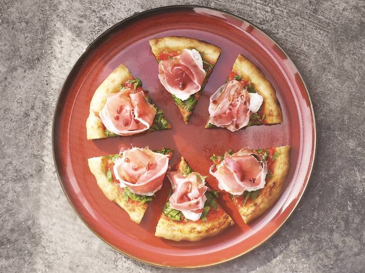 Stracciatella, prosciutto, rucola and fig vincoto pizza