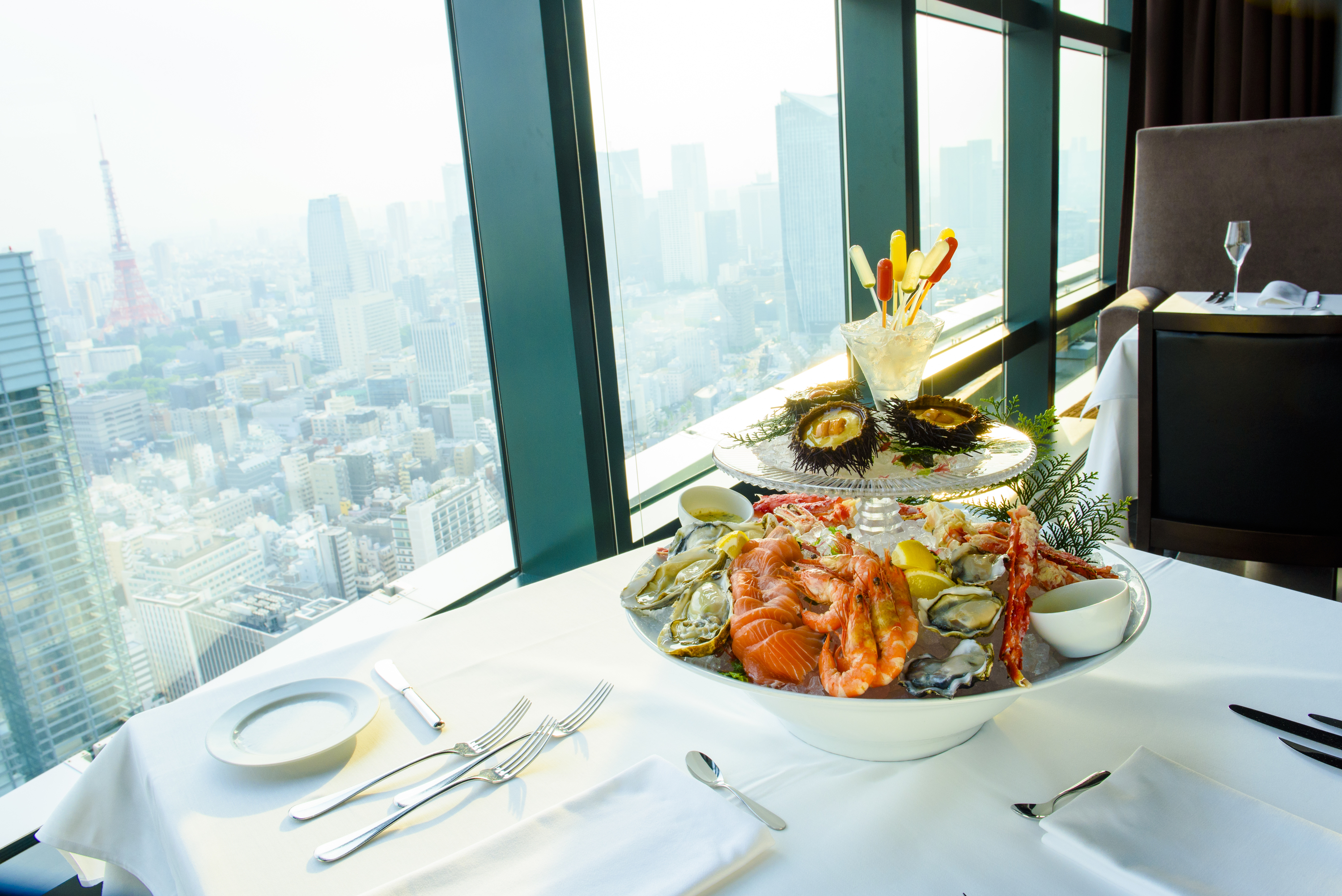 Main dining with a panoramic view of Tokyo Tower and Tokyo - Fishbank Tokyo  Shiodome