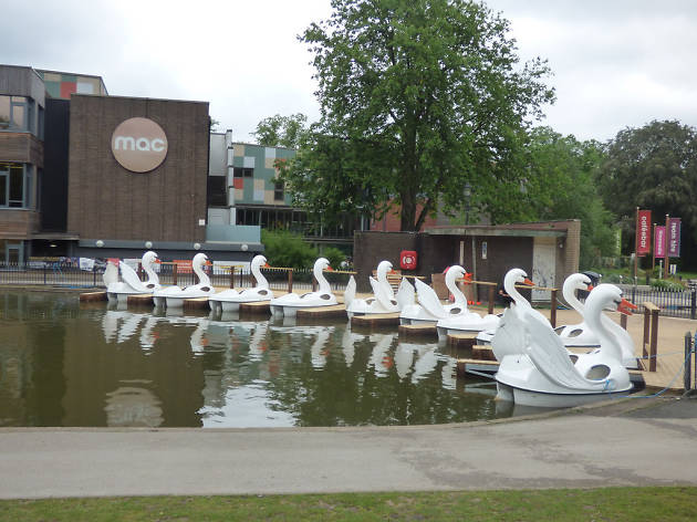 Swan boats at Cannon Hill Park, Birmingham Swan boats at Cannon Hill Park, Birmingham