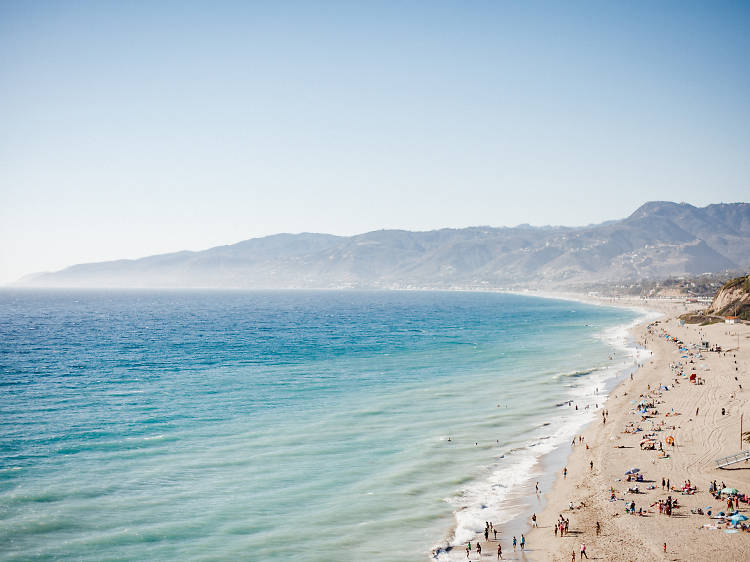 ZUMA BEACH, CALIFORNIA, USA - People on Zuma beach, public beach