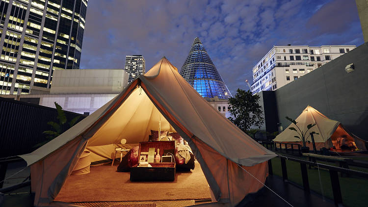 A glamping tent at night on top of Melbourne Central