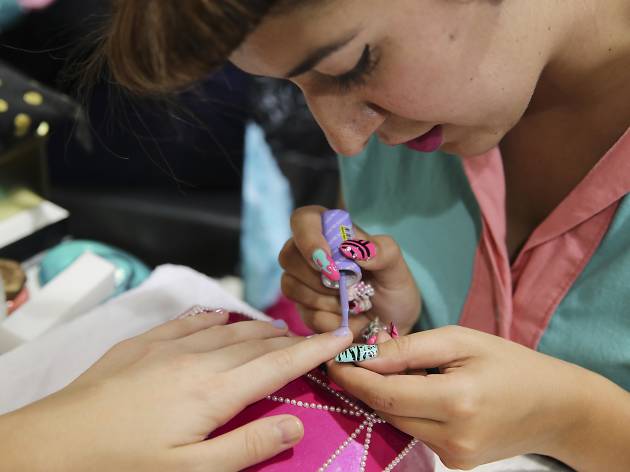 Lauren La Rouge Nails by La Rouge Lauren La Rouge painting nails in a salon