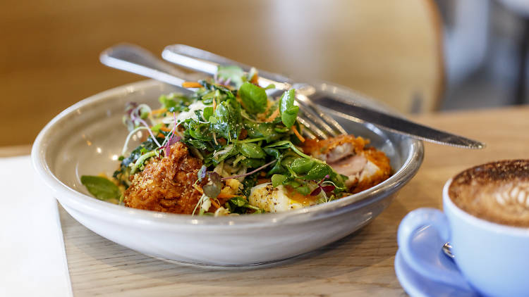 Southern fried chicken, Aleppo pepper, maple butter, cornbread crumble, kale 'slaw and 65° poached egg at Odyssea, $20