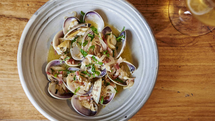 Shark bay clams, prosciutto, garlic, parsley and chargrilled common loaf at Il Lido, $19