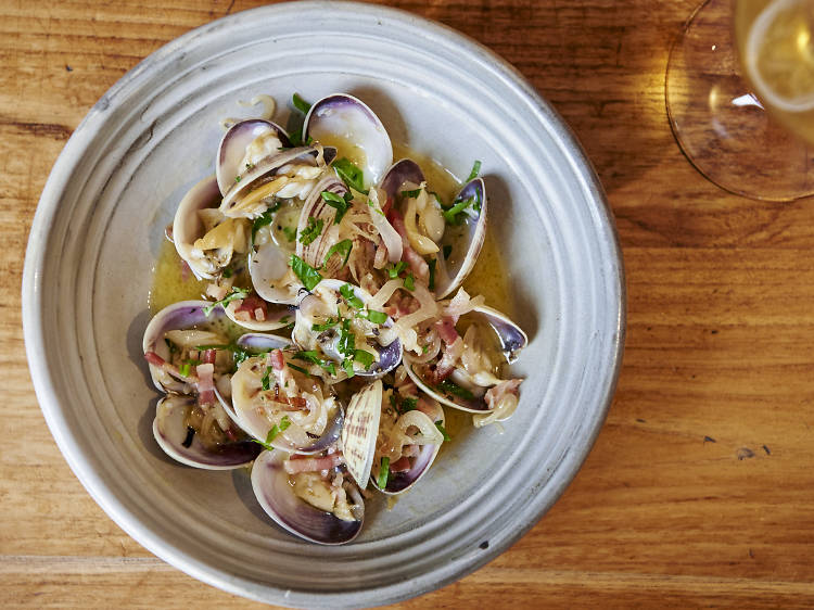 Shark bay clams, prosciutto, garlic, parsley and chargrilled common loaf at Il Lido, $19