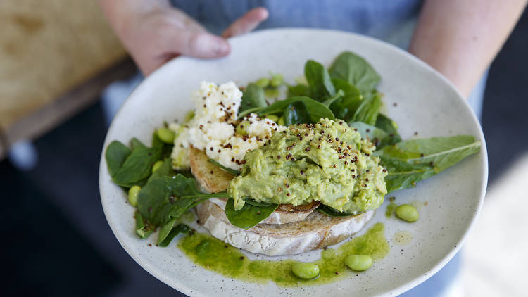 Smashed avo, edamame beans on toast, ricotta, mint and crispy quinoa at Bib & Tucker, $19