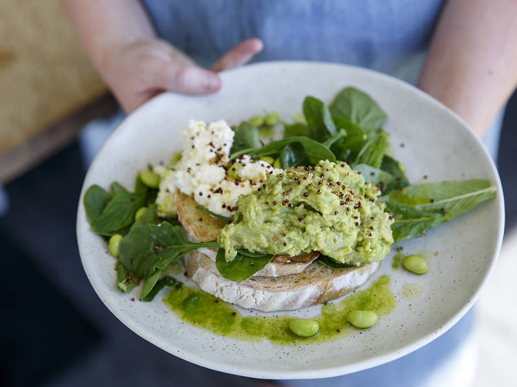 Smashed avo, edamame beans on toast, ricotta, mint and crispy quinoa at Bib & Tucker, $19