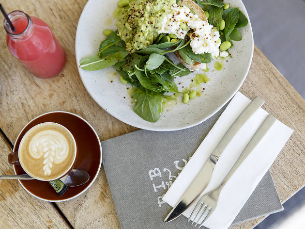 Smashed avo, edamame beans on toast, ricotta, mint and crispy quinoa at Bib & Tucker Smashed avo, edamame beans on toast, ricotta, mint and crispy quinoa at Bib & Tucker