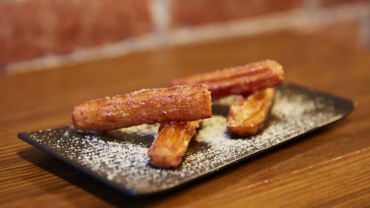 Goat’s cheese churros with truffle honey at Estelle Bistro, $14