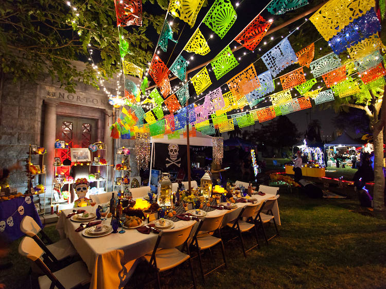 Amble through rows of altars at a Day of the Dead celebration