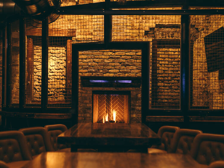 March 26: Visit a bar with a fireplace