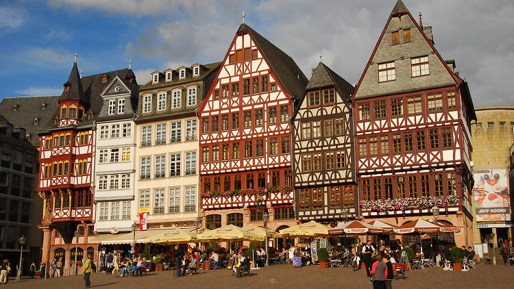 A row of old timber-framed buildings in Römerberg.
