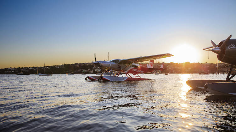 Catch a seaplane at sunset